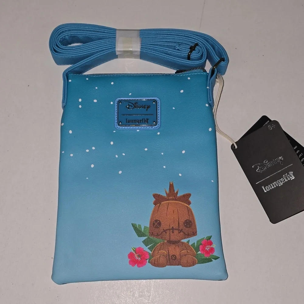 Disney Lilo and Stitch Carved Wood Tiki Stitch Passport Bag NWT